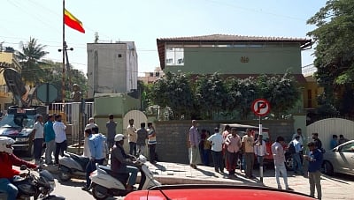 Bengaluru: People gather outside the residence of actor Yash where Income Tax officials are carrying out raids in Bengaluru, on Jan 3, 2019. (Photo: IANS)