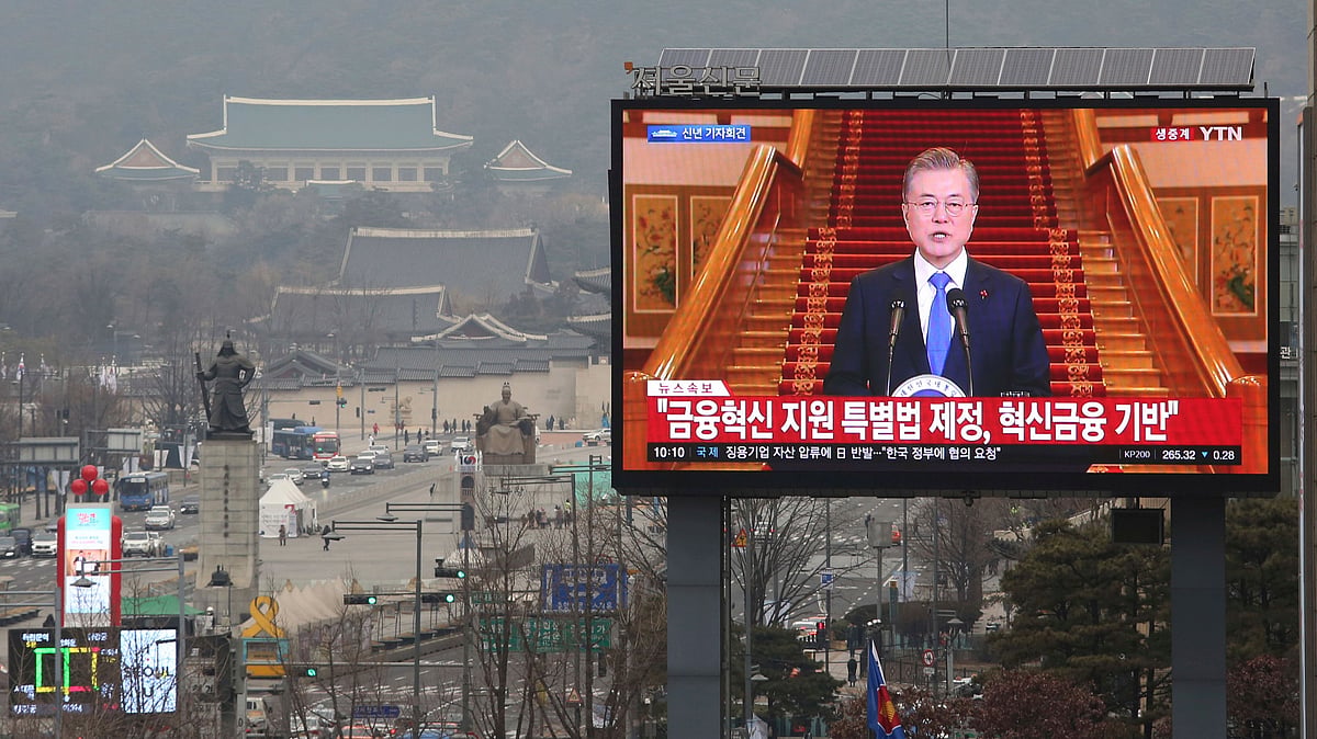 A TV screen shows the live broadcast of South Korean President Moon Jae-in’s press conference in Seoul, South Korea, Thursday, 10 January 2019. 