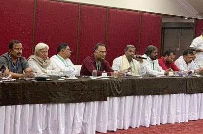 Bengaluru: Congress leader Siddaramaiah accompanied by party leaders G Parameshwara and Dinesh Gundu Rao during Congress Legislature Party (CLP) meeting to discuss the political situation in the state, in Bengaluru on Jan 19, 2019. (Photo: IANS)