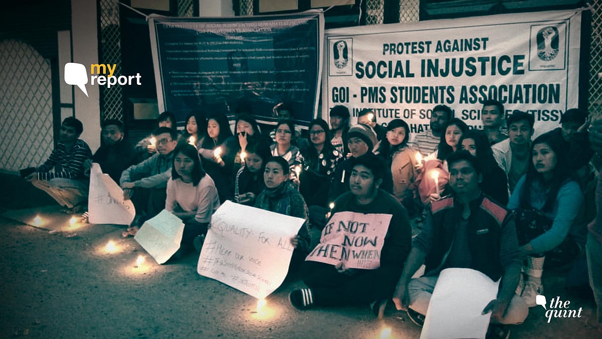 Students protest against the administration’s withdrawal of fee waivers. 
