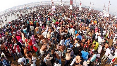 Prayagraj: Devotees take a holy dip on Makar Sankranti at Kumbh mela in Prayagraj on Jan. 15, 2019. (Photo: Saket Suman/IANS)