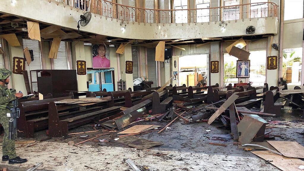 Two bombs minutes apart tore through a Roman Catholic cathedral on a southern Philippine island.