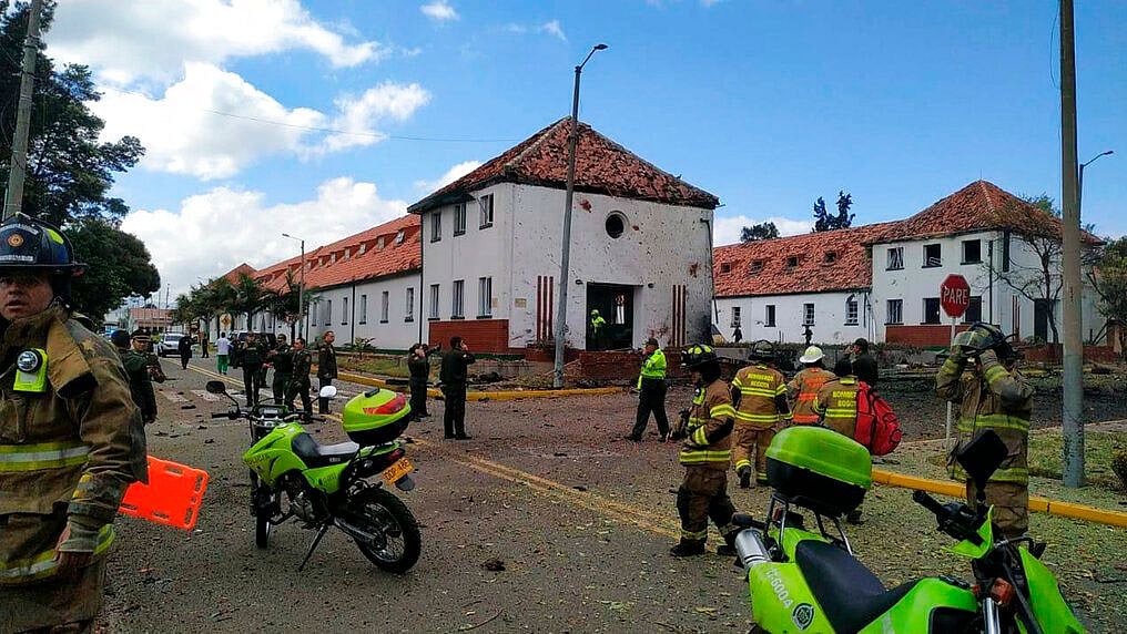 Emergency personnel respond to the scene of the car bombing  in Bogota, Colombia.