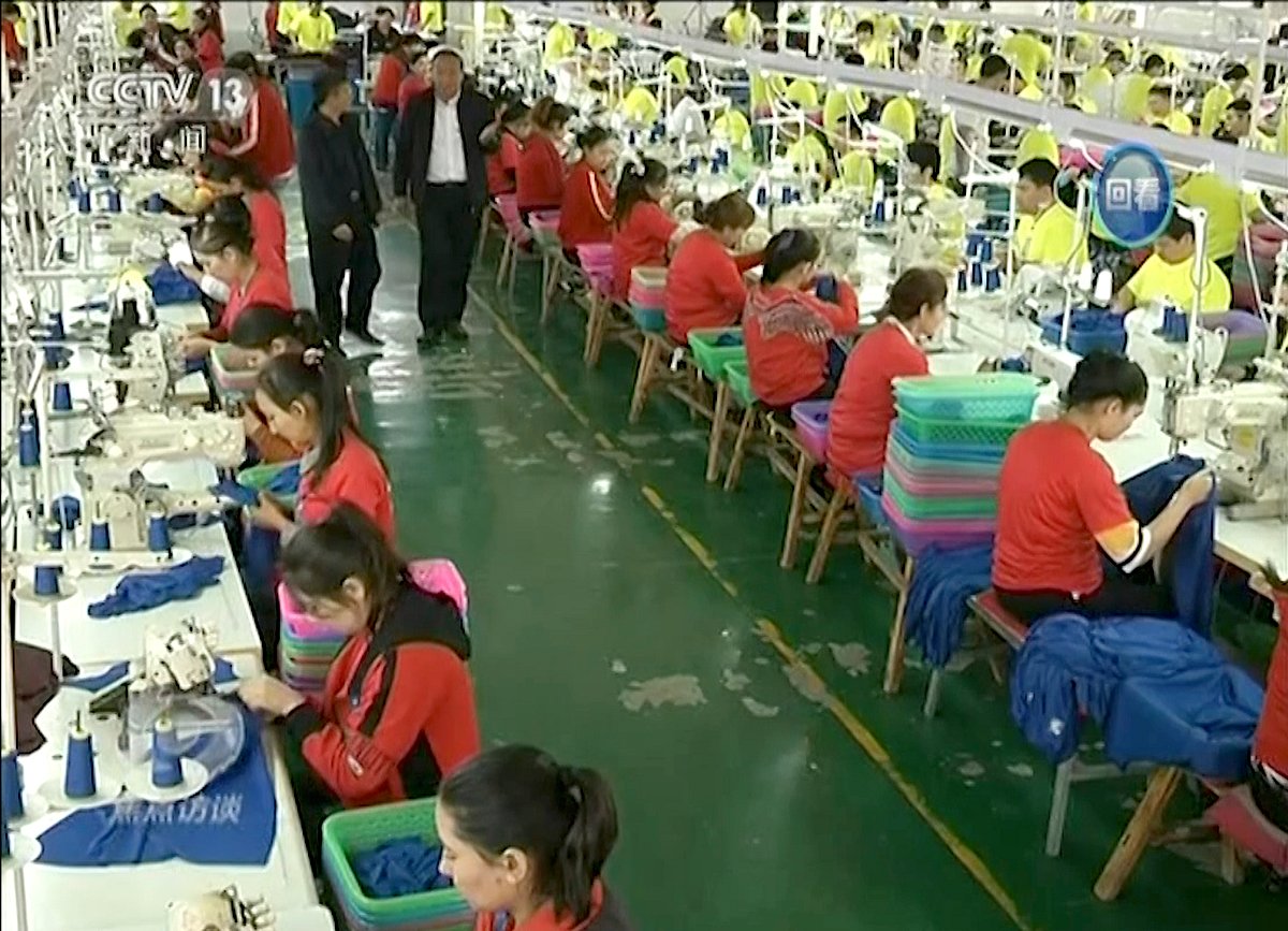 A US supplier of T-shirts and other team apparel to college bookstores has cut ties with a Chinese company that drew workers from an internment camp holding targeted members of ethnic minority groups.