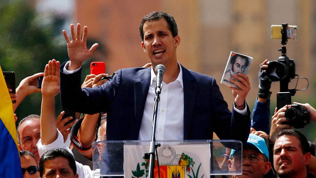 Juan Guaido, head of Venezuela’s Opposition-run Congress, declared himself interim president of Venezuela, during a rally demanding President Nicolas Maduro’s resignation in Caracas on 23 January 2019. 