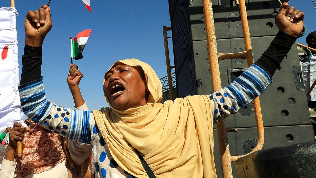 Supporters of Sudan’s President Omar al-Bashir attend a pro-government rally in Khartoum, Sudan, 9 January Wednesday, 2019.