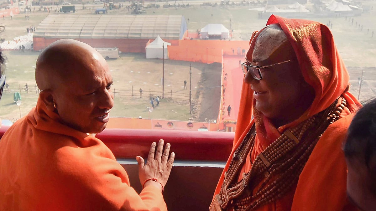 Yogi Adityanath with Swami Hanshdevacharya inspects the Kumbh Mela area from Shri Aadi Shanker Viman Mandpam temple at Sangam in Allahabad, Sunday, Dec 2, 2018. Image used for representation.
