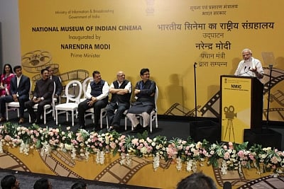 Mumbai: Prime Minister Narendra Modi addresses at the inauguration of National Museum of Indian Cinema, in Mumbai on Jan 19, 2019. Also seen Maharashtra Governor C. Vidyasagar Rao, Chief Minister Devendra Fadnavis, Union Minister Rajyavardhan Singh Rathore, filmmaker Shyam Benegal and Central Board of Film Certification (CBFC) Chairperson Prasoon Joshi. (Photo: IANS/PIB)