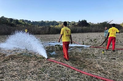 Ksan: Odisha firefighters dewater the coal mine in their bid to rescue the 15 coal miners trapped in inside, in Ksan village of Meghalaya