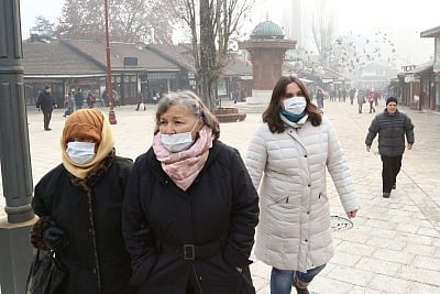 Air Pollution: People walk on the streets of Sarajevo - the capital of Bosnia and Herzegovina wearing masks so as to avoid breathing polluted air.  (File Photo: Xinhua/Haris Memija/IANS)