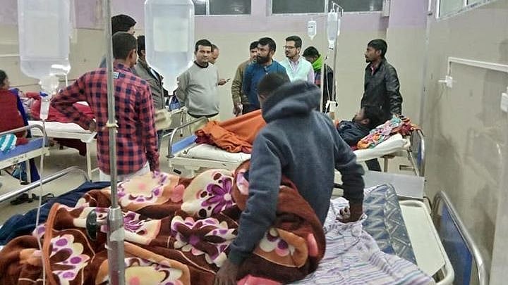 People undergoing treatment at the Jorhat hospital after drinking the illicit liquor.