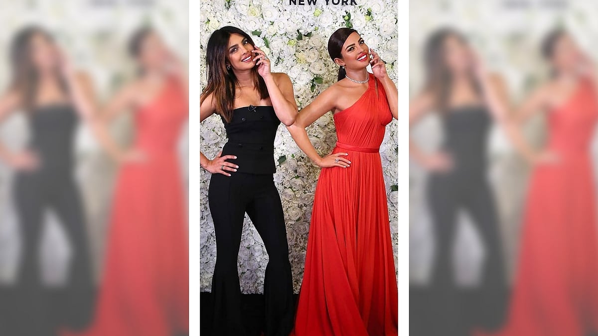 Priyanka Chopra poses next to her wax figurine by Madame Tussauds.