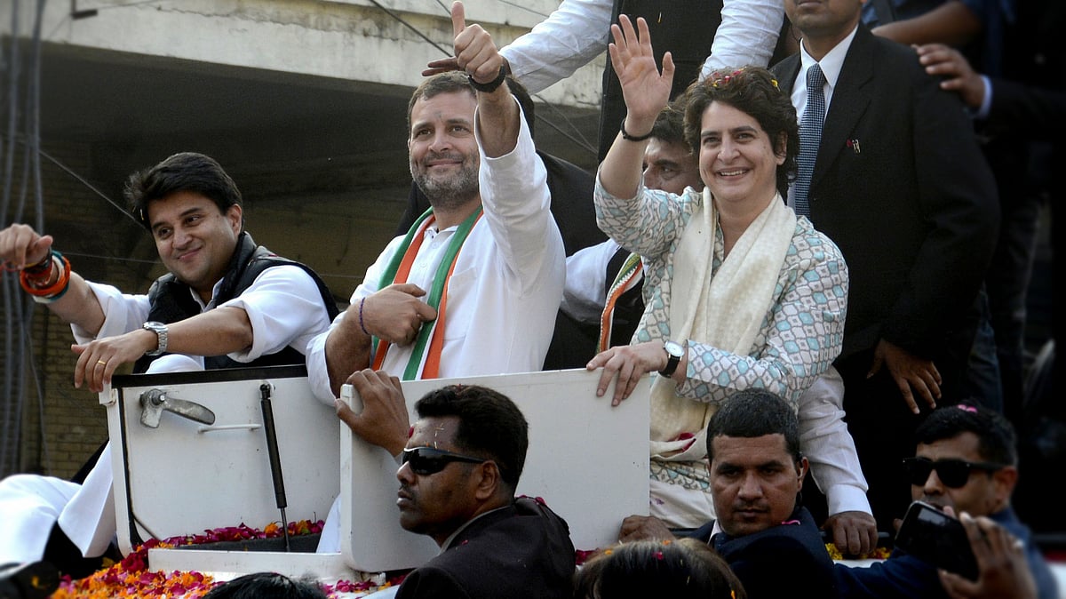 Rahul Gandhi, Priyanka Gandhi Vadra, and Jyotiraditya Scindia, wave at supporters during a rally in Lucknow on Monday, 11 February 2019.