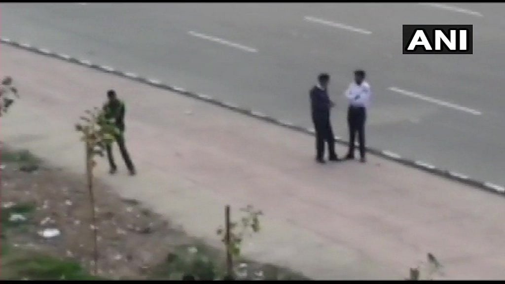 Police present near the Akshardham temple after the gunshots.