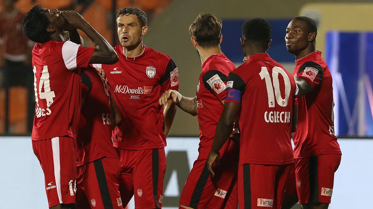  NorthEast United FC players celebrate their 2-0 win against Mumbai City FC on Wednesday.