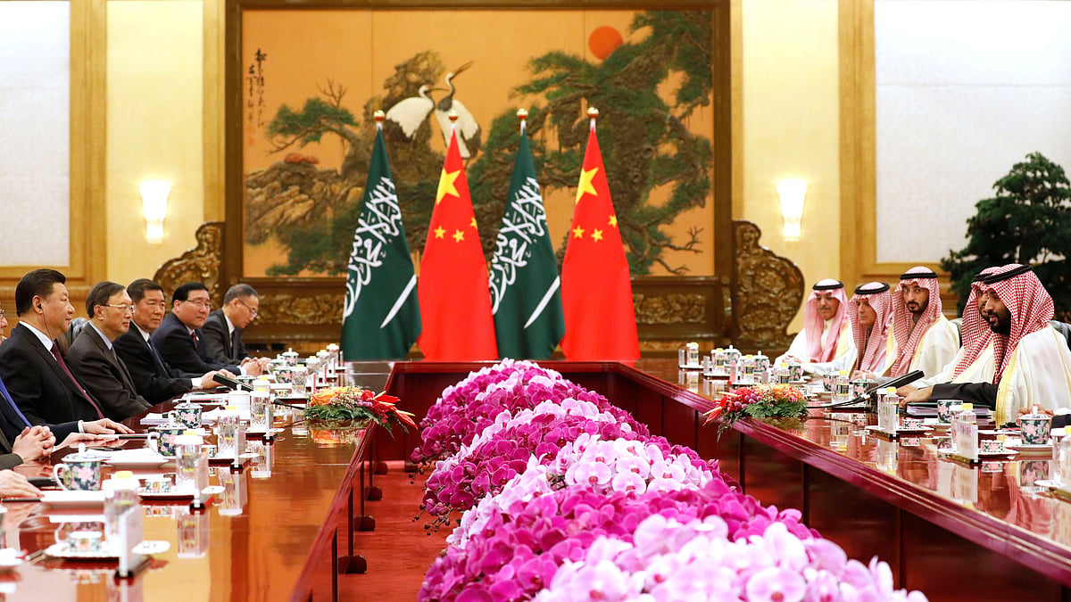 Saudi Crown Prince Mohammed bin Salman, right, speaks to Chinese President Xi Jinping, left, during a meeing at the Great Hall of the People in Beijing.