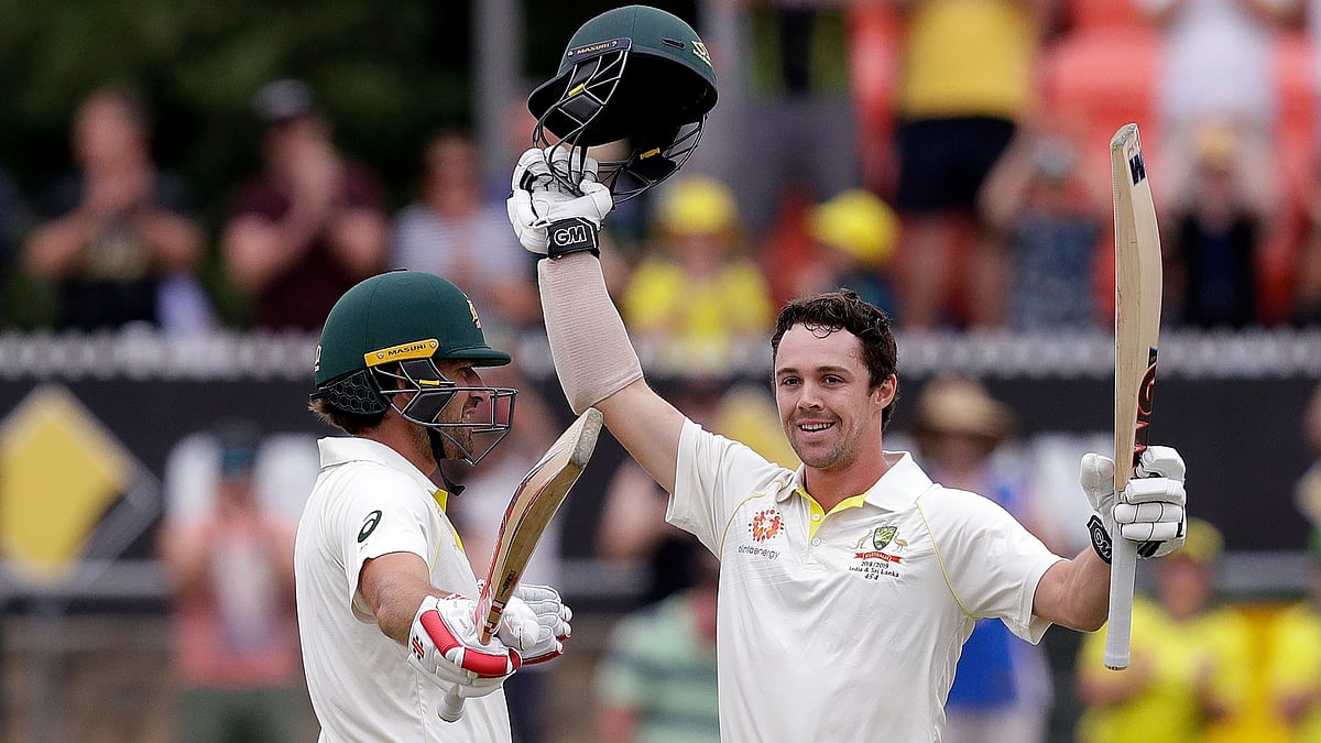 Joe Burns (left) and Travis Head scored centuries to power Australia to 384/4 on Day 1 of their second Test vs Sri Lanka at Canberra.