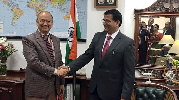 Ashwani Lohani (right).