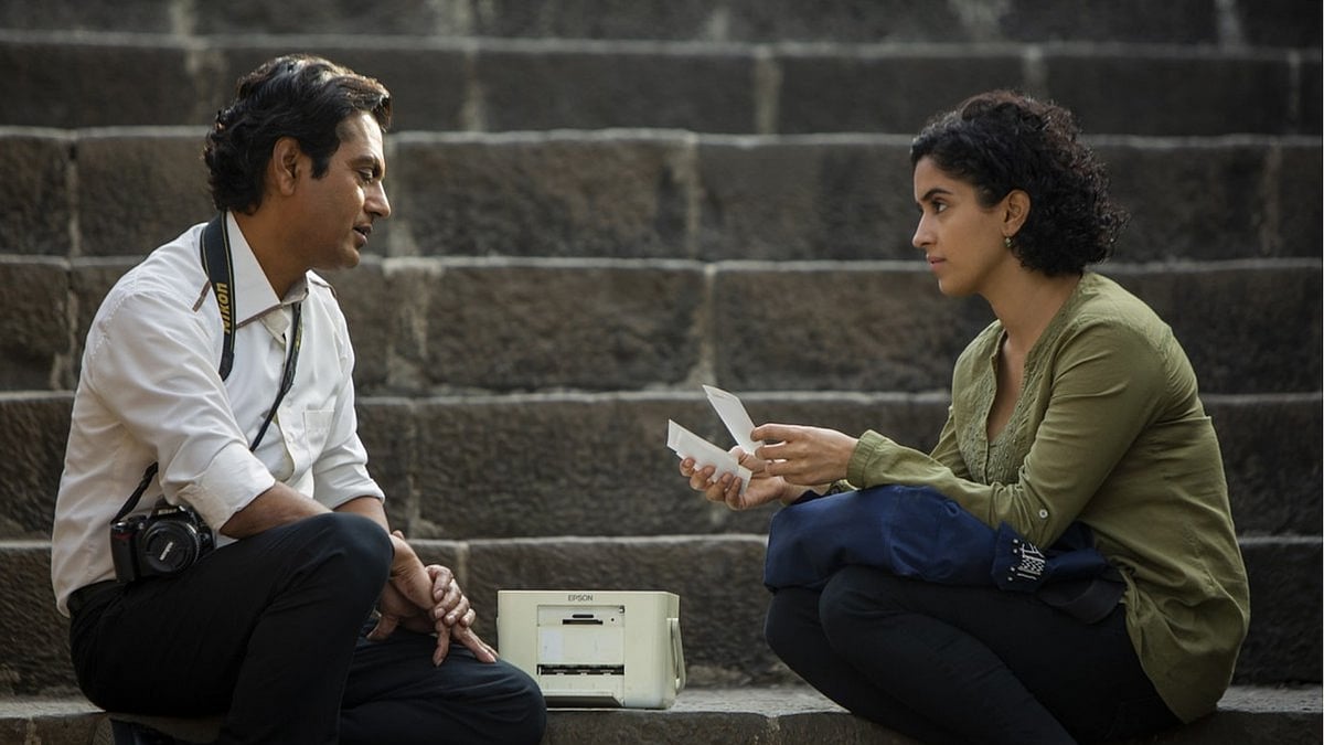 Nawazuddin Siddiqui and Sanya Malhotra in a still from <i>Photograph</i>.