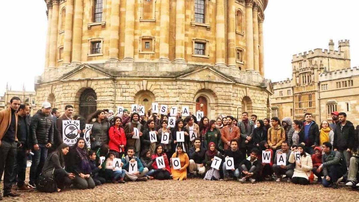 Indian and Pakistani students join hands in protesting against war mongering.
