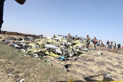 ADDIS ABABA, March 11, 2019 (Xinhua) -- Photo taken on March 11, 2019 shows the crash site of an Ethiopian Airlines plane near Bishoftu town, about 45 km from the capital Addis Ababa, Ethiopia. The Nairobi-bound Boeing 737-8 MAX crashed on Sunday, just minutes from takeoff from Addis Ababa Bole International Airport, killing all 157 people aboard. Earlier on Monday, Ethiopian Airlines announced its decision to suspend commercial operations of all Boeing 737-Max 8 aircraft. (Xinhua/Michael Teweld