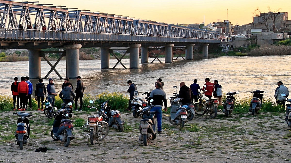 An overloaded ferry with people celebrating the Kurdish new year sank in the Tigris River.