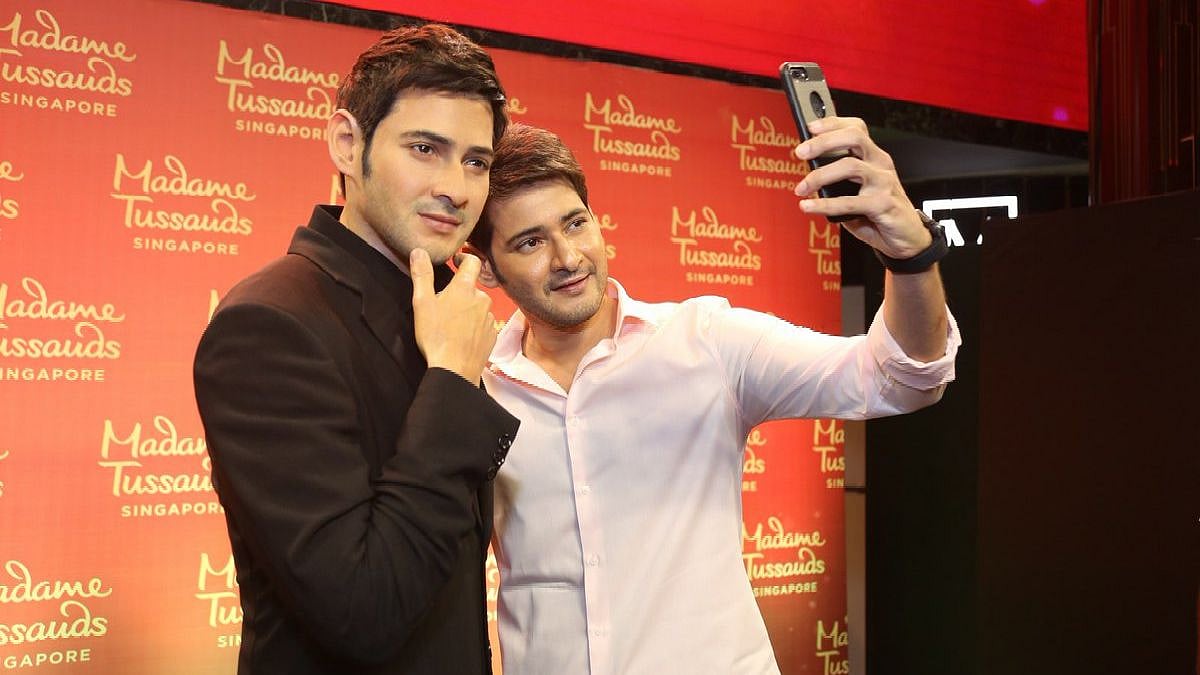 Mahesh takes a selfie with his wax statue.
