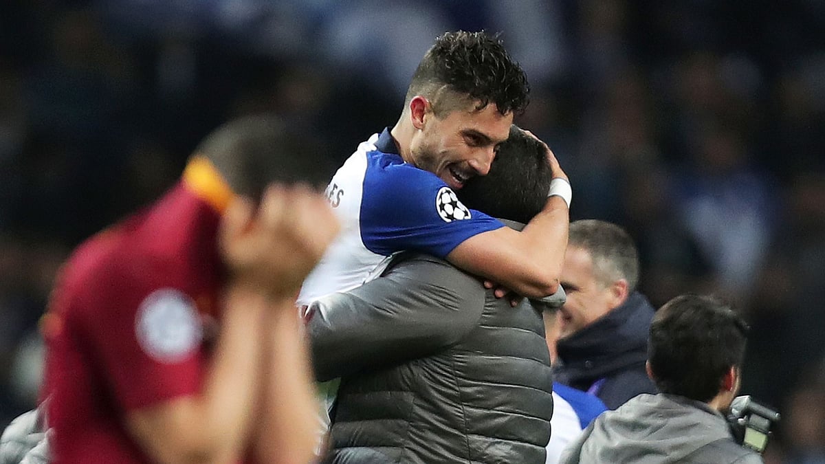 Alex Telles scored a penalty in extra time to send Porto into the Champions League quarter-finals with a 3-1 victory over Roma.