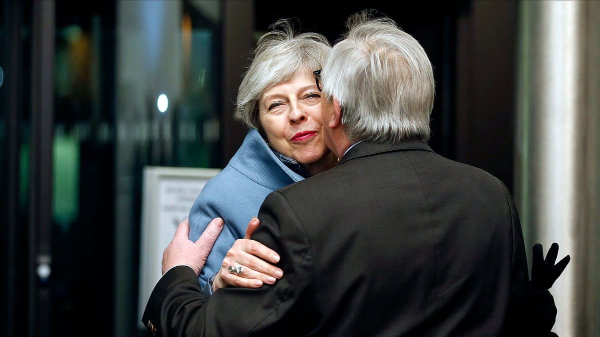 British Prime Minister Theresa May is welcomed by European Commission President Jean-Claude Juncker in Strasbourg, France.