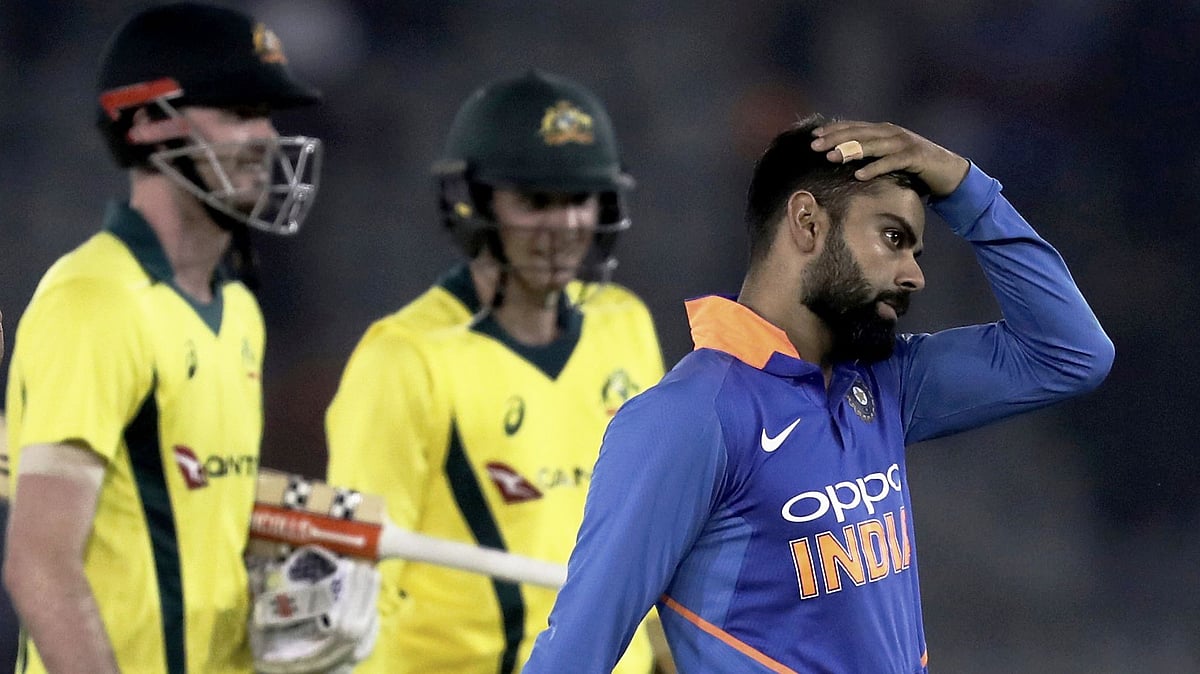 Captain Virat Kohli cuts a dejected figure after India’s loss in the fourth ODI against Australia at Mohali.