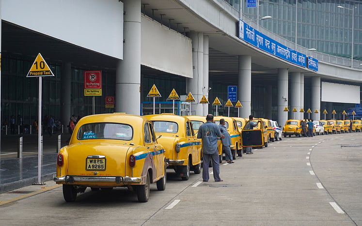 Yellow Ambassador taxi cars waiting for passengers in Kolkata