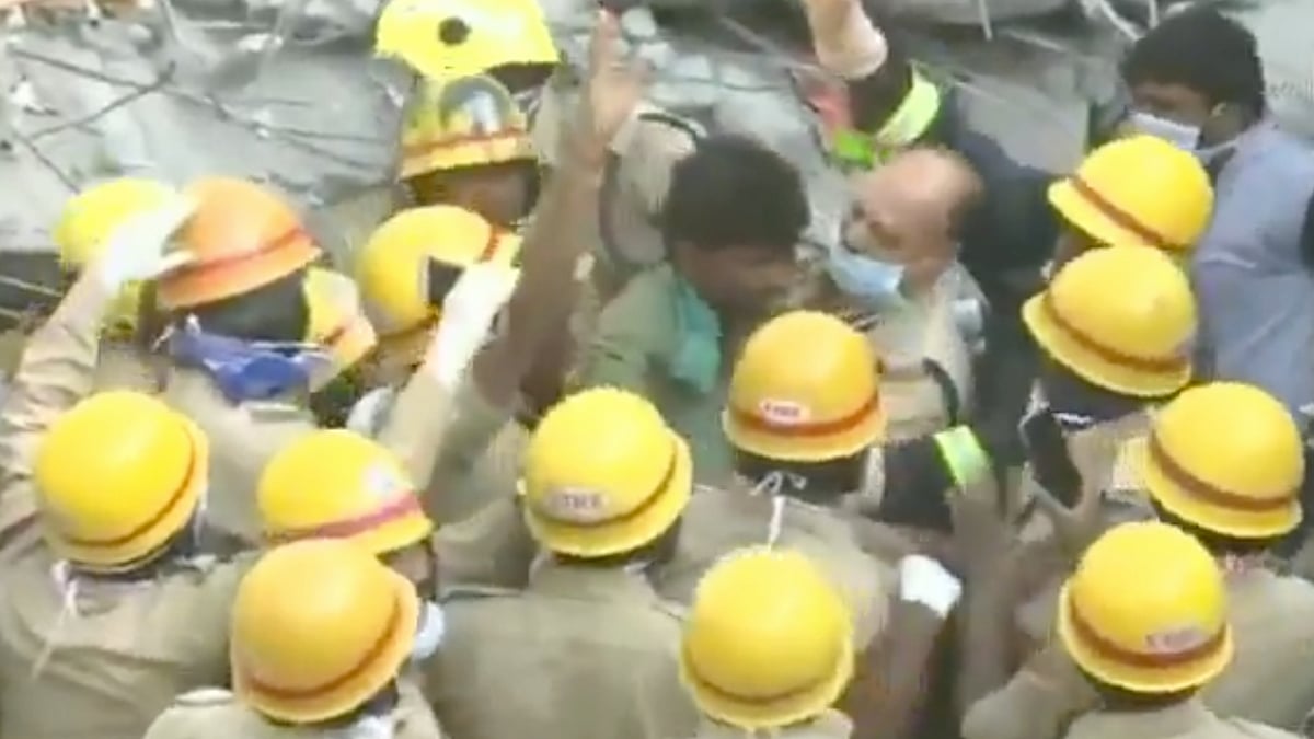 Visuals of a man being pulled out from debris two days after the Dharwad building collapsed. 