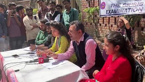 Students of physics department with professor Sachin Nirmala Narayan at Arts faculty talk about mass failure in department. 