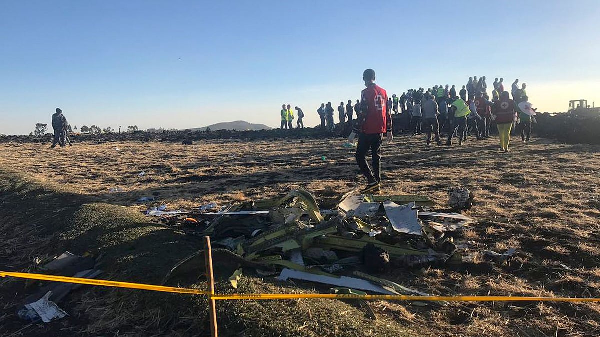 Rescuers search at the scene of an Ethiopian Airlines flight that crashed shortly after takeoff in Ethiopia on Sunday, 10 March.