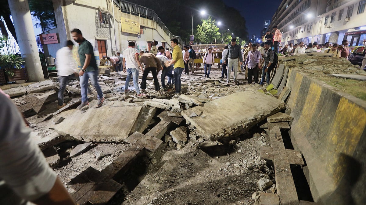 Rescue work in progress after a foot overbridge near CSMT station collapsed in south Mumbai