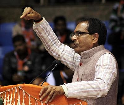 New Delhi: Madhya Pradesh Chief Minister Shivraj Singh Chauhan during a party rally at Talkatora Stadium in New Delhi on Jan. 30, 2015. (Photo: Sunil/Majumdar/ IANS)