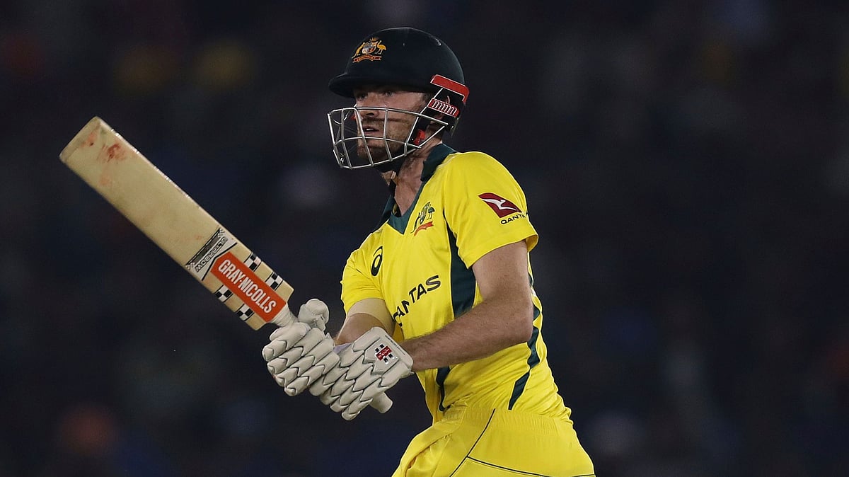 Australia’s Ashton Turner watches the ball after hitting it for a six during the fourth one day international cricket match between India and Australia in Mohali.