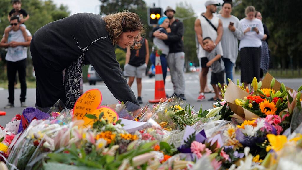 Mourners paying their respects at a makeshift memorial near the Masjid Al Noor mosque on 16 March 2019 at Christchurch in New Zealand, where one of the two mass shootings occurred. 