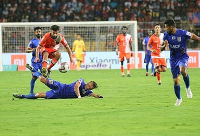 Fatorda (Goa): Players in action during an ISL semi-final match between FC Goa and Mumbai City FC at the Jawaharlal Nehru Stadium in Fatorda, Goa on March 12, 2019. (Photo: IANS)