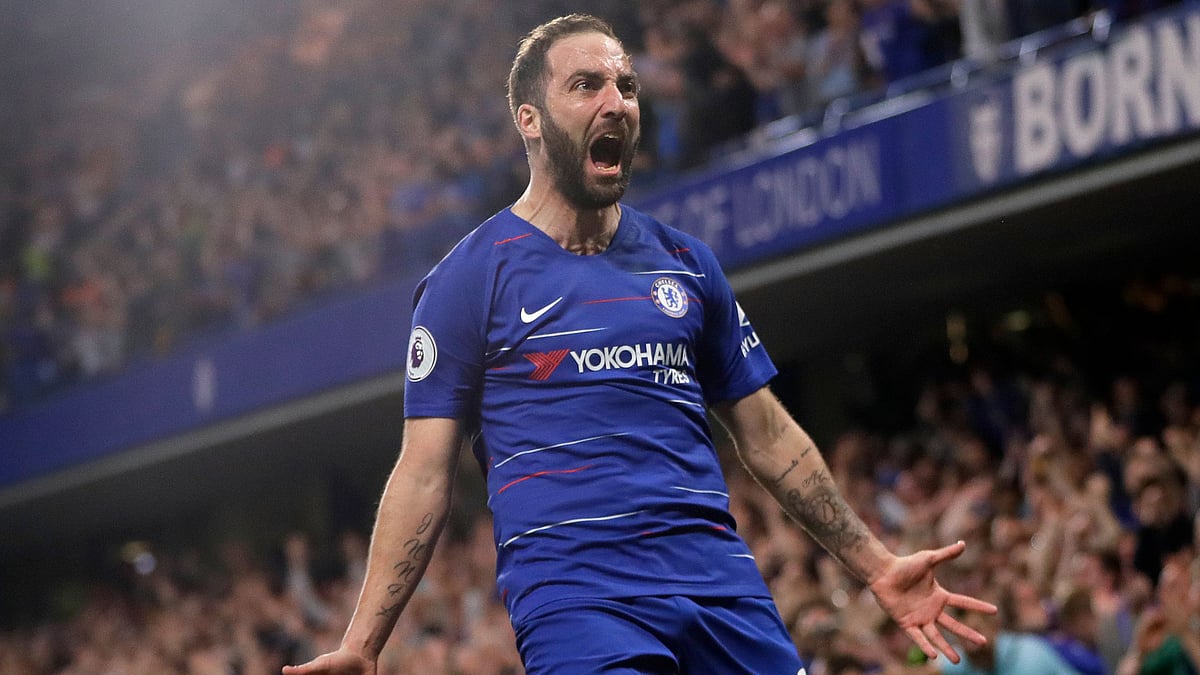 Gonzalo Higuain celebrates scoring his side’s second goal during the English Premier League football match between Chelsea and Burnley.