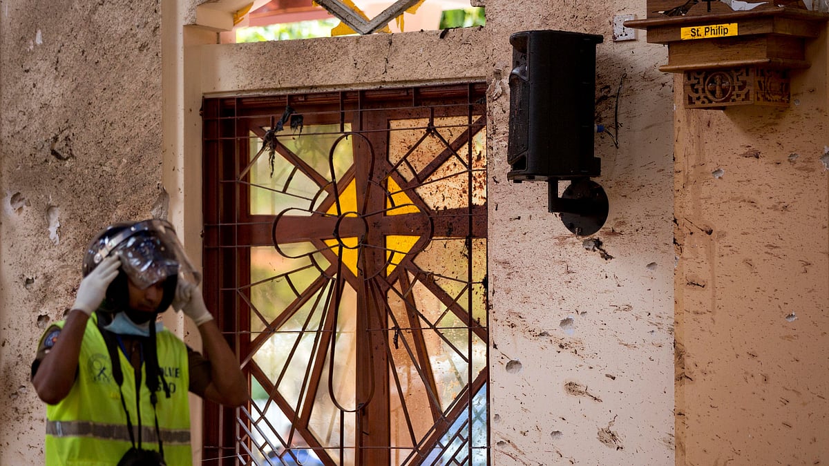 An investigator at the scene of a suicide bombing at St Sebastian Church in Negombo, Sri Lanka. Image used for representational purposes.&nbsp;