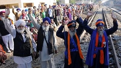  Sikh pilgrims arrive at Attari railway station as they prepare to leave for Pakistan to participate in the birth anniversary celebrations of 1st Sikh Guru, Guru Nanak Dev to be held at Gurdwara Nankana Sahib. Image used for representational purpose.