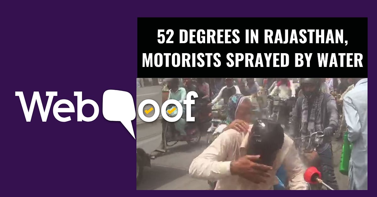 Image accompanying Heat soars in Rajasthan to 52 degrees and motorists are being sprayed with water on the roads to beat the heat.