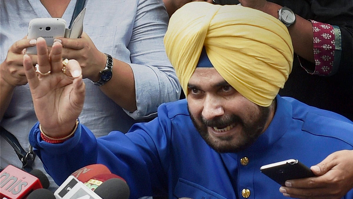 Navjot Singh Sidhu briefing the media.
