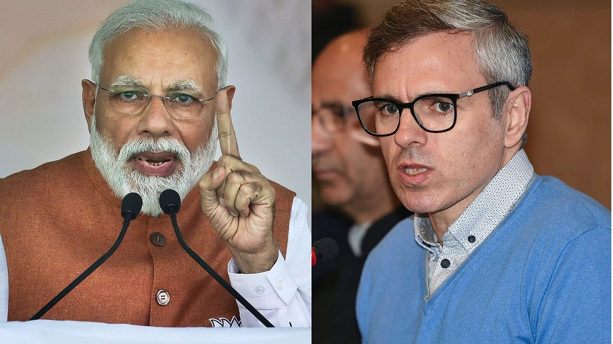 Prime Minister Narendra Modia and National Conference leader Omar Abdullah.