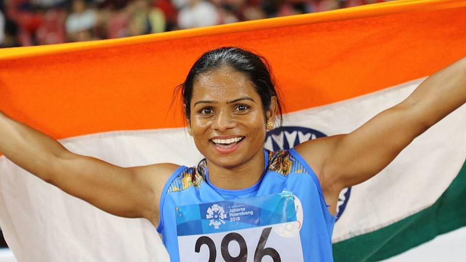 Dutee Chand celebrating after her record breaking sprint at the 23rd Asian Athletics Championships in Doha.