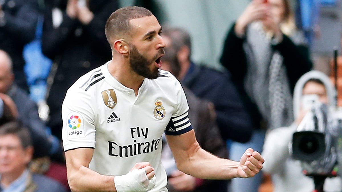 Real Madrid’s Karim Benzema celebrates after he scored his side’s second goal during a Spanish La Liga soccer match between Real Madrid and Eibar at the Santiago Bernabeu stadium in Madrid, Spain, Saturday April 6, 2019. 