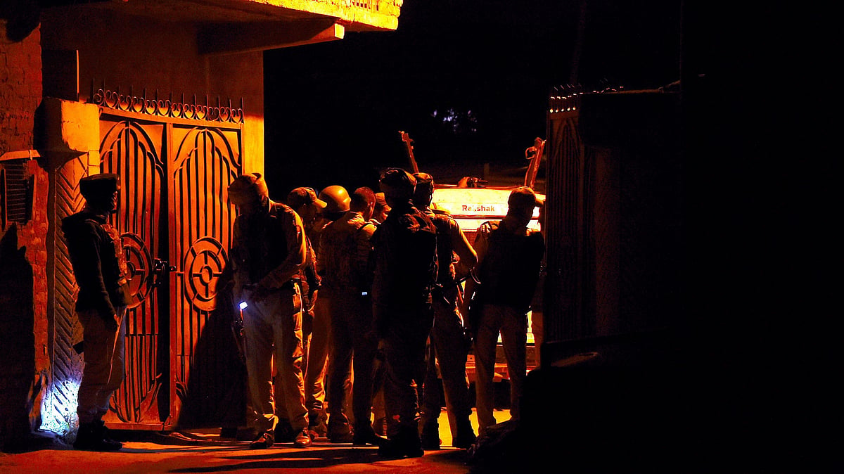 Special Operation Group (SOG) of police inspecting the police post which was attacked by the suspected militants at Chanapora in Srinagar on 26 April. 