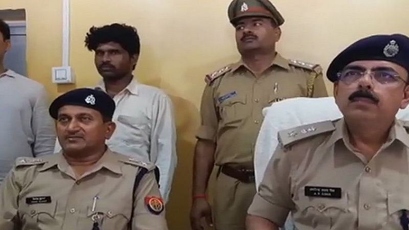 The man in the white shirt is the accused in the case.
