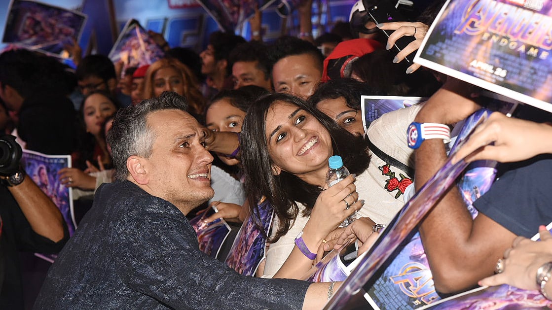 Joe Russo clicks a selfie with a fan at the event.&nbsp;